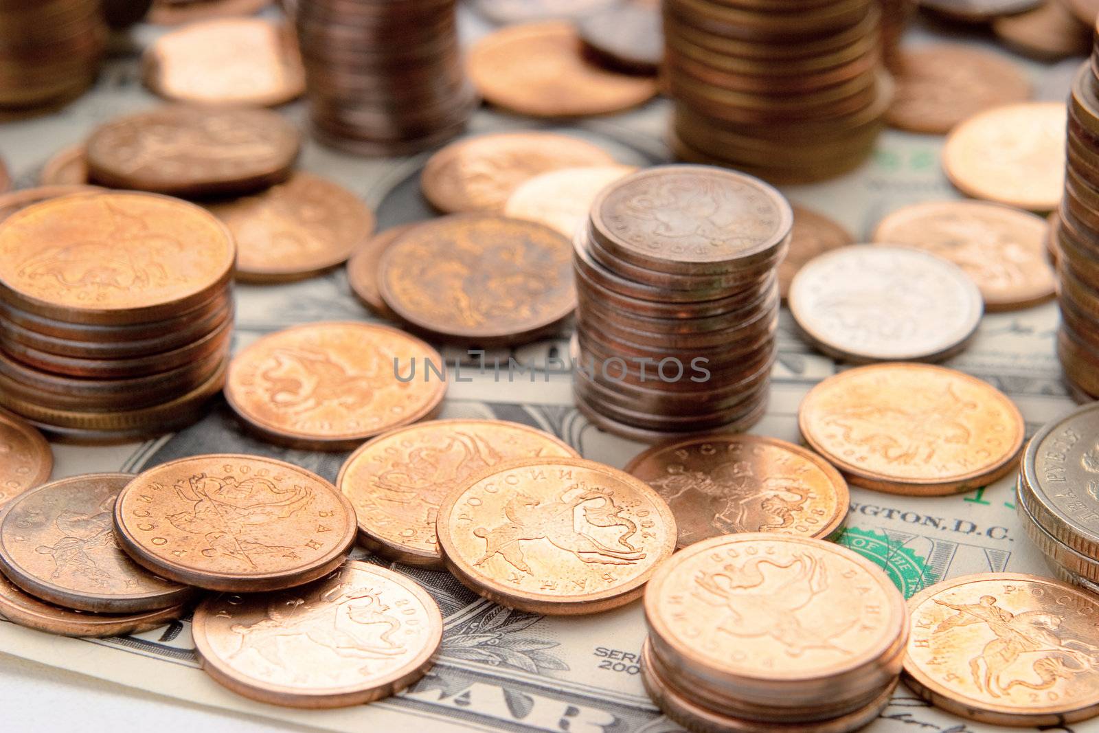 Piles of coins. The concept of cash, savings, finance and business
