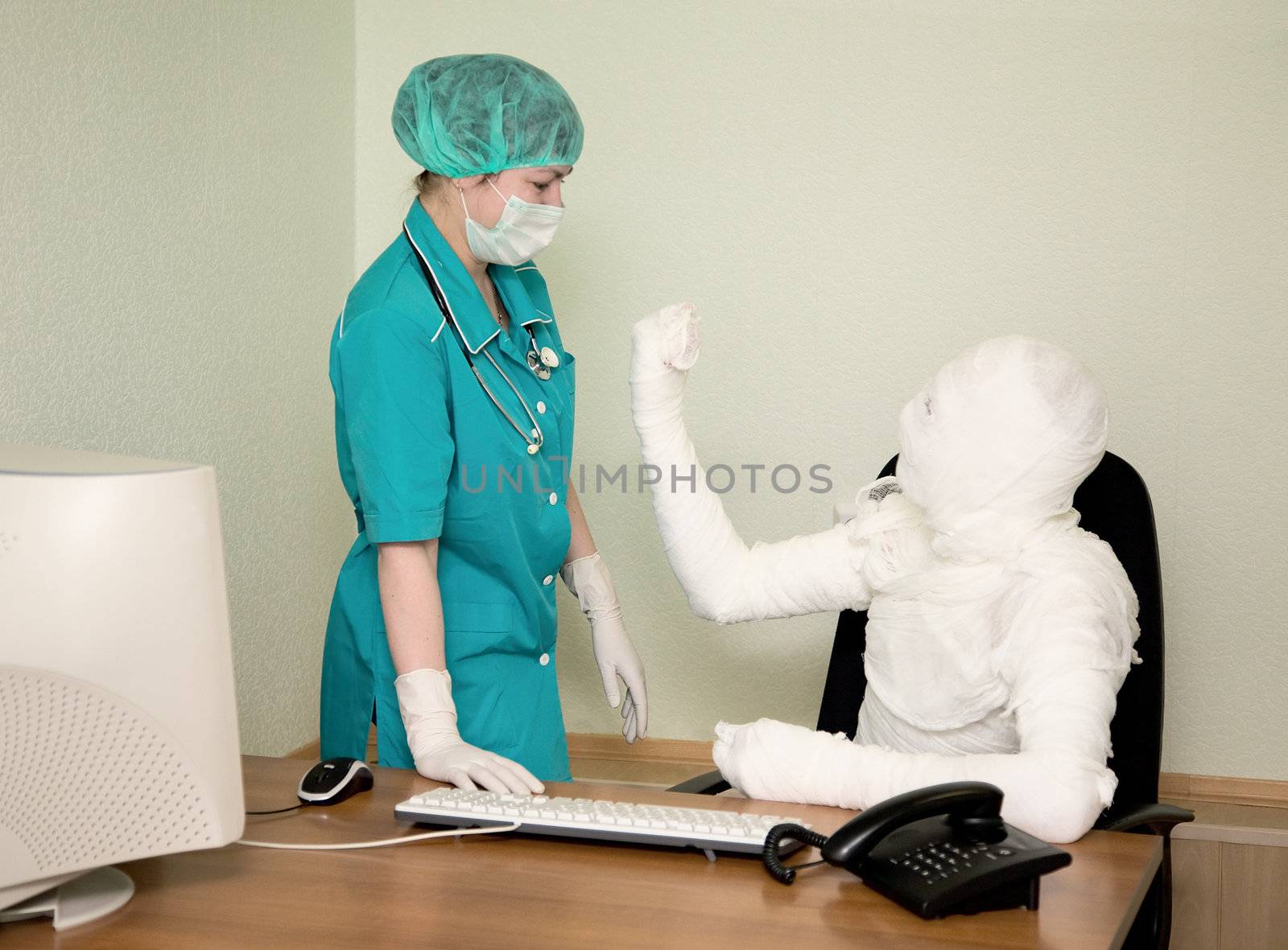 Bandaged boss to shake one's fist at nurse