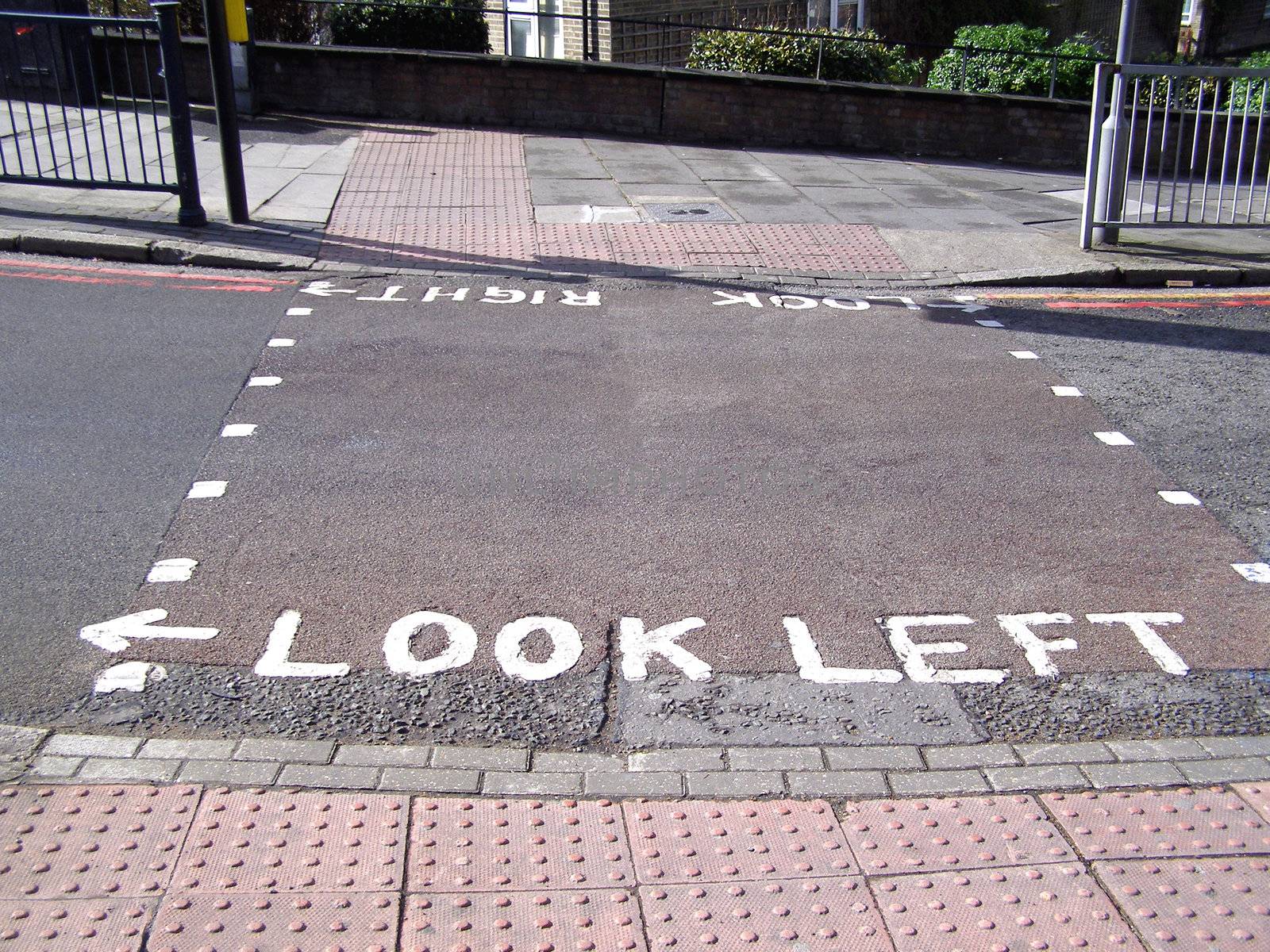 Look right look left sign on London zebra crossing