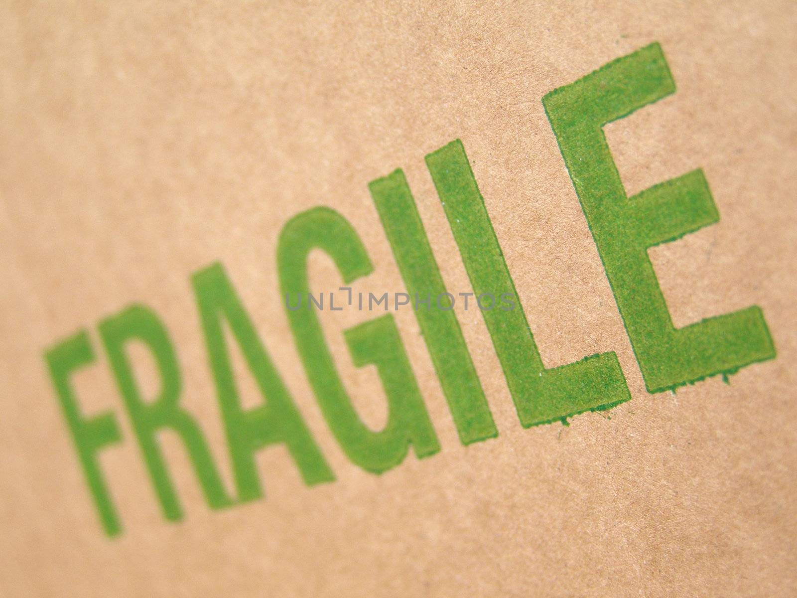 Fragile written on corrugated cardboard box