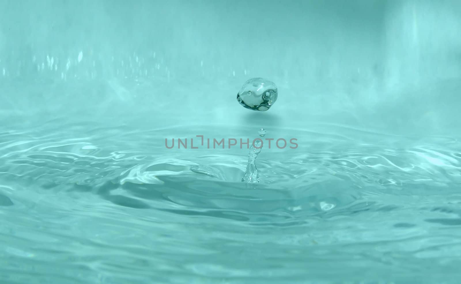 Water drop on blue background