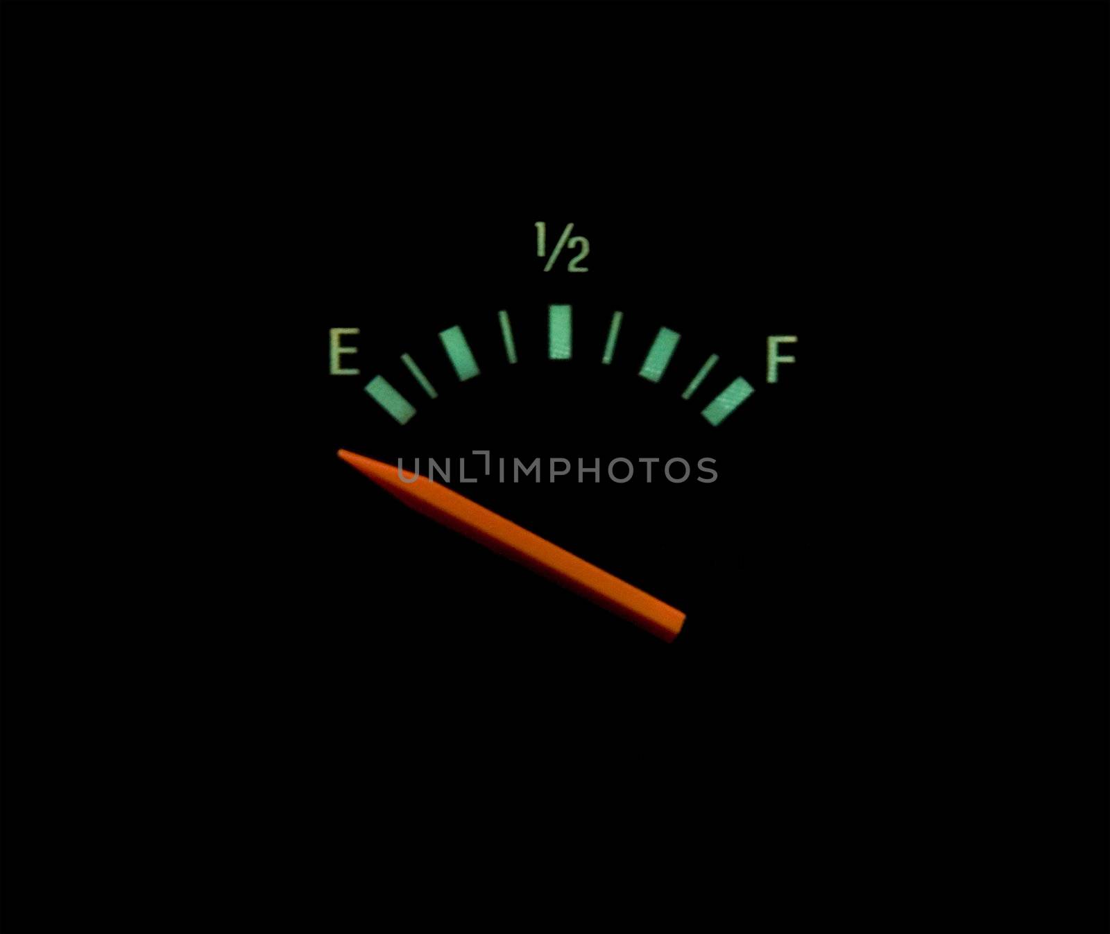 gas gauge on empty bright colors on black background