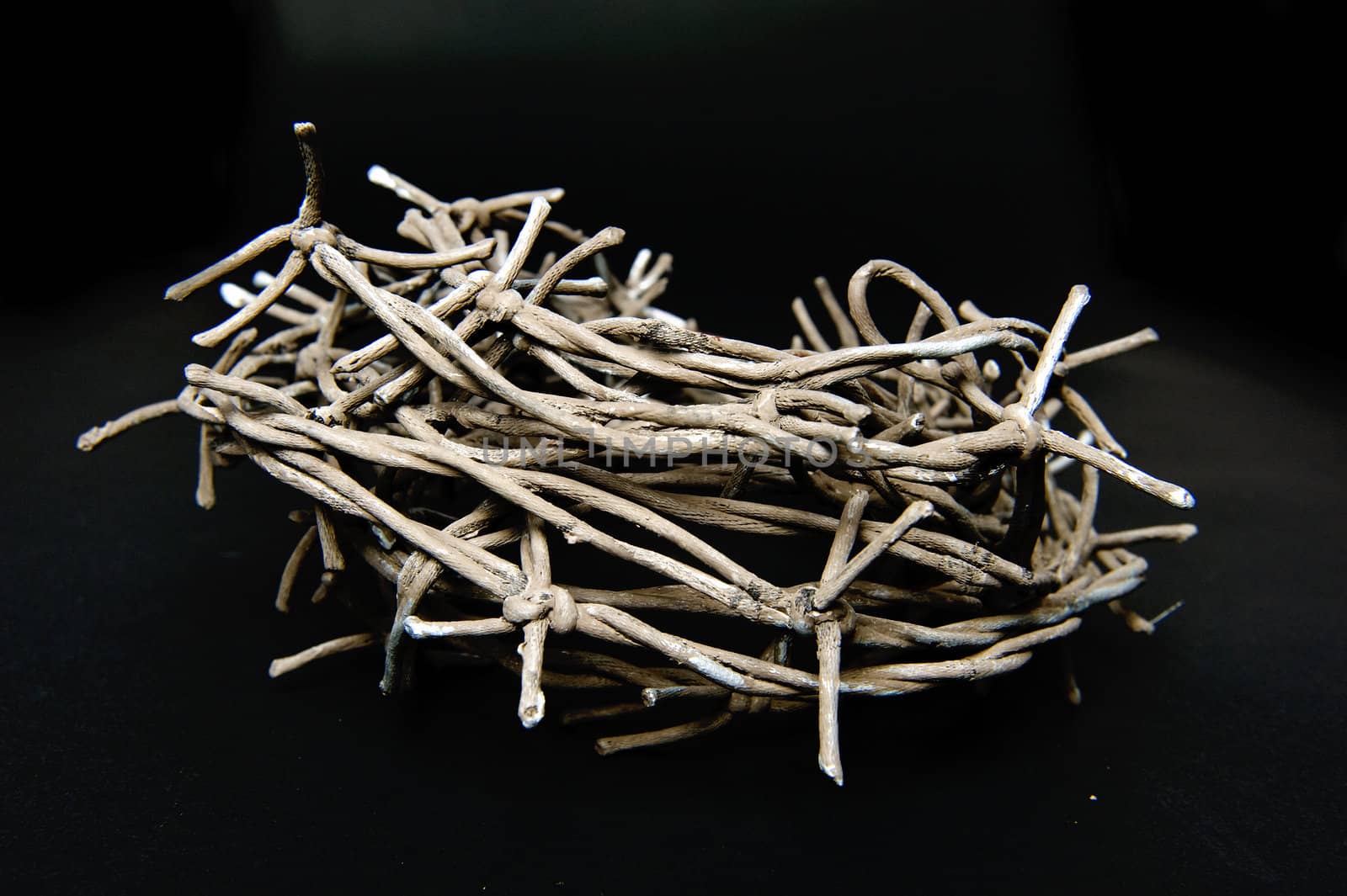 a roller barbed wire on a black background