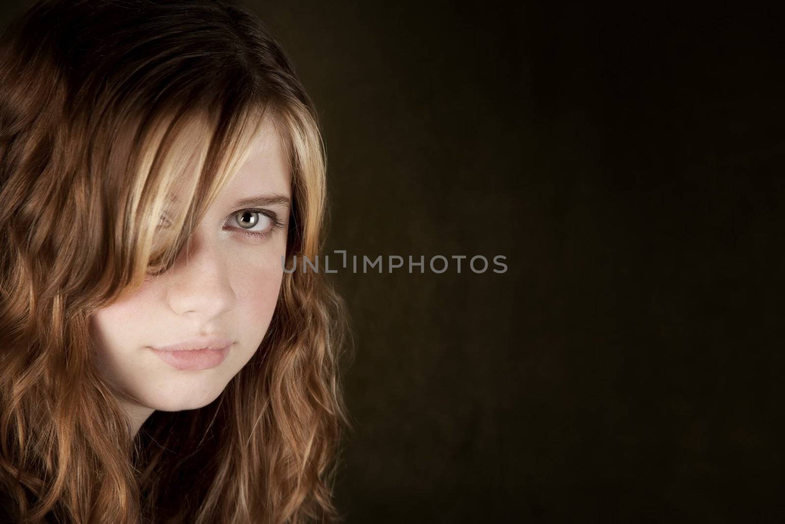 Portrait of pretty teen girl with green eyes