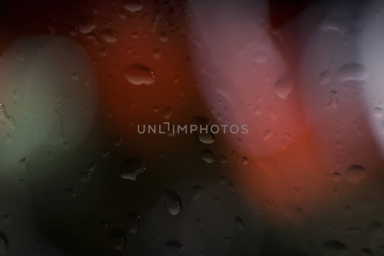 Rain drops on glass close up nice background concept