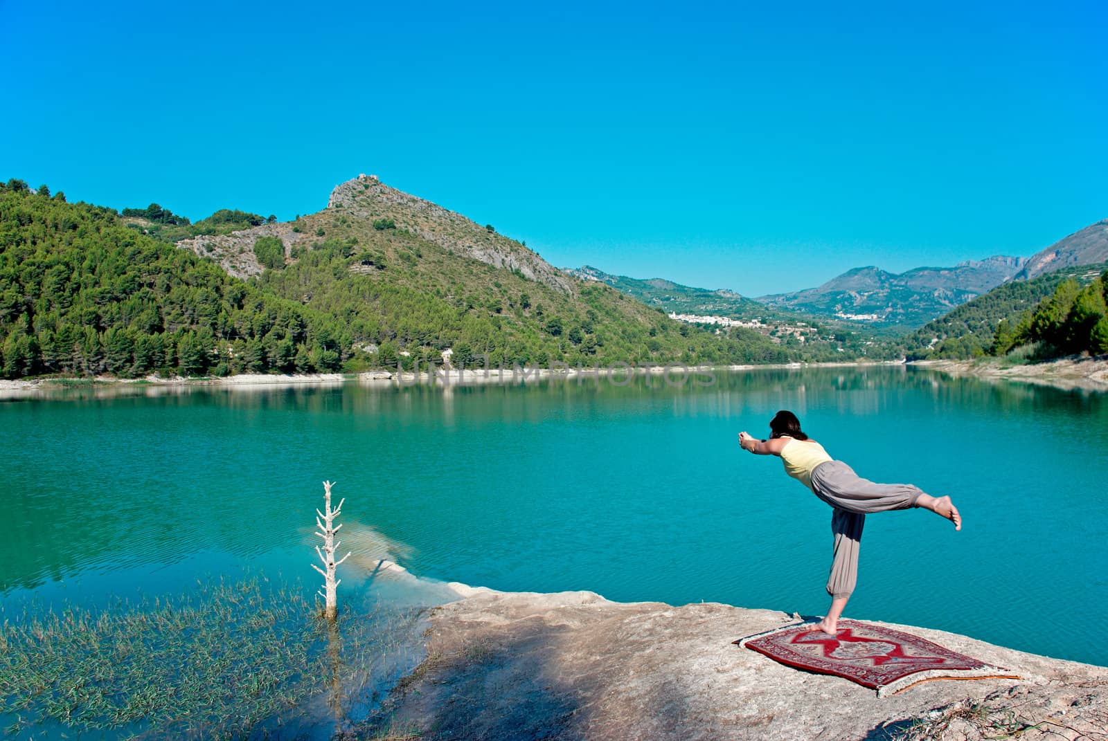 Early morning yoga lakeside