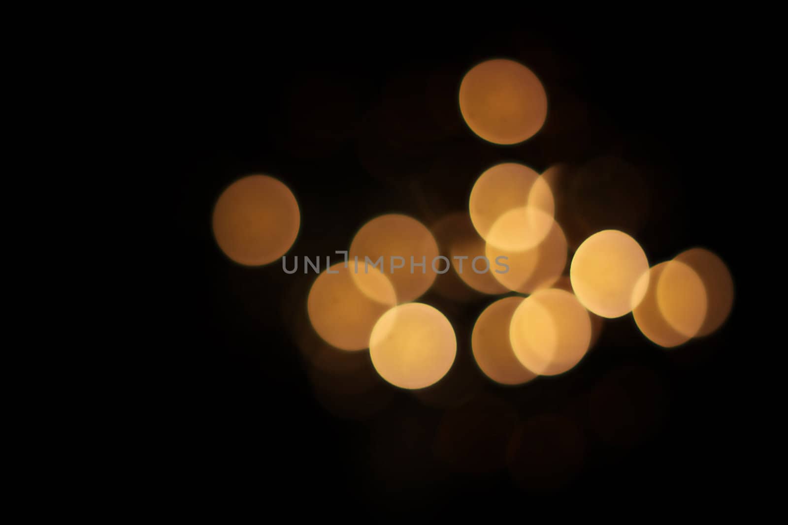 Lights shot purposefully out of focus. Could yse as a lens flare. Great use for a holiday or festive background!