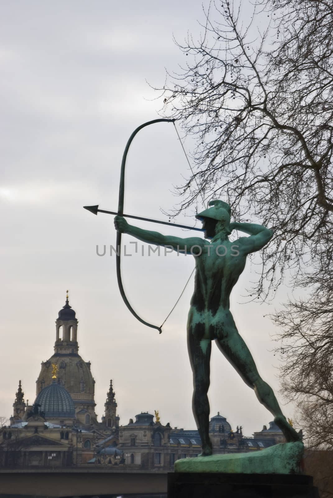 famous statue of the Archer in Dresden, Saxony with the Frauenkirche in the background