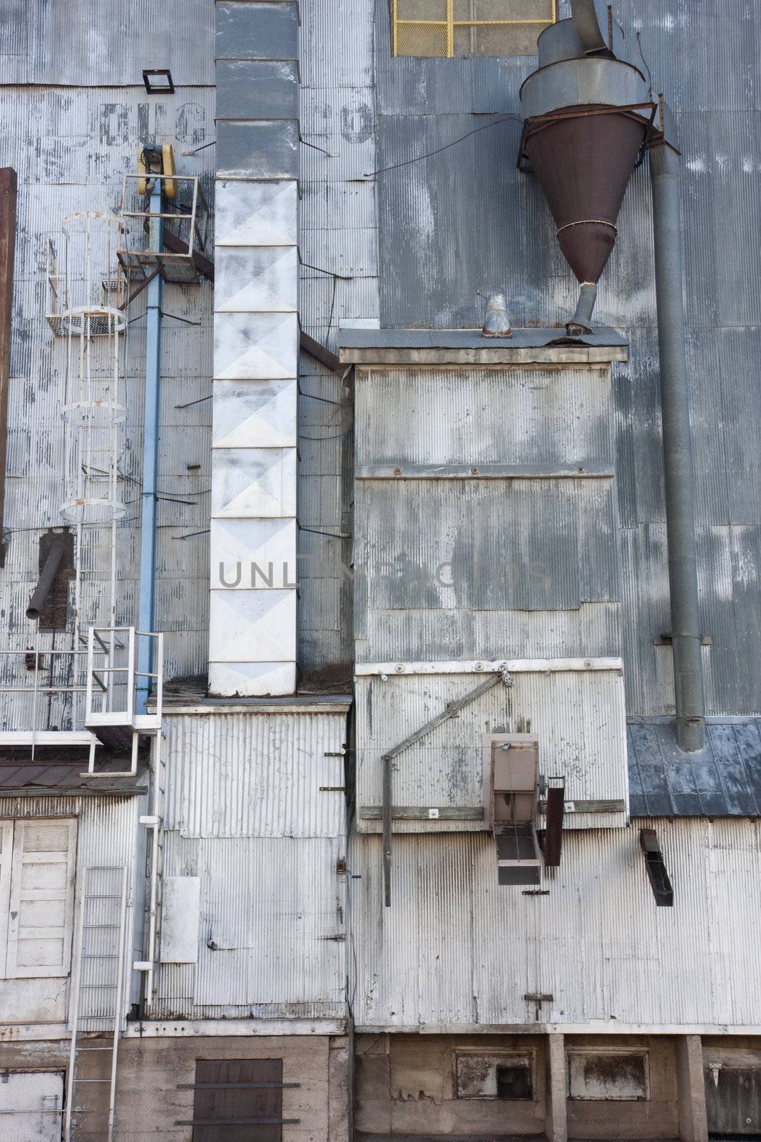 industrial background - old grain elevator by PixelsAway