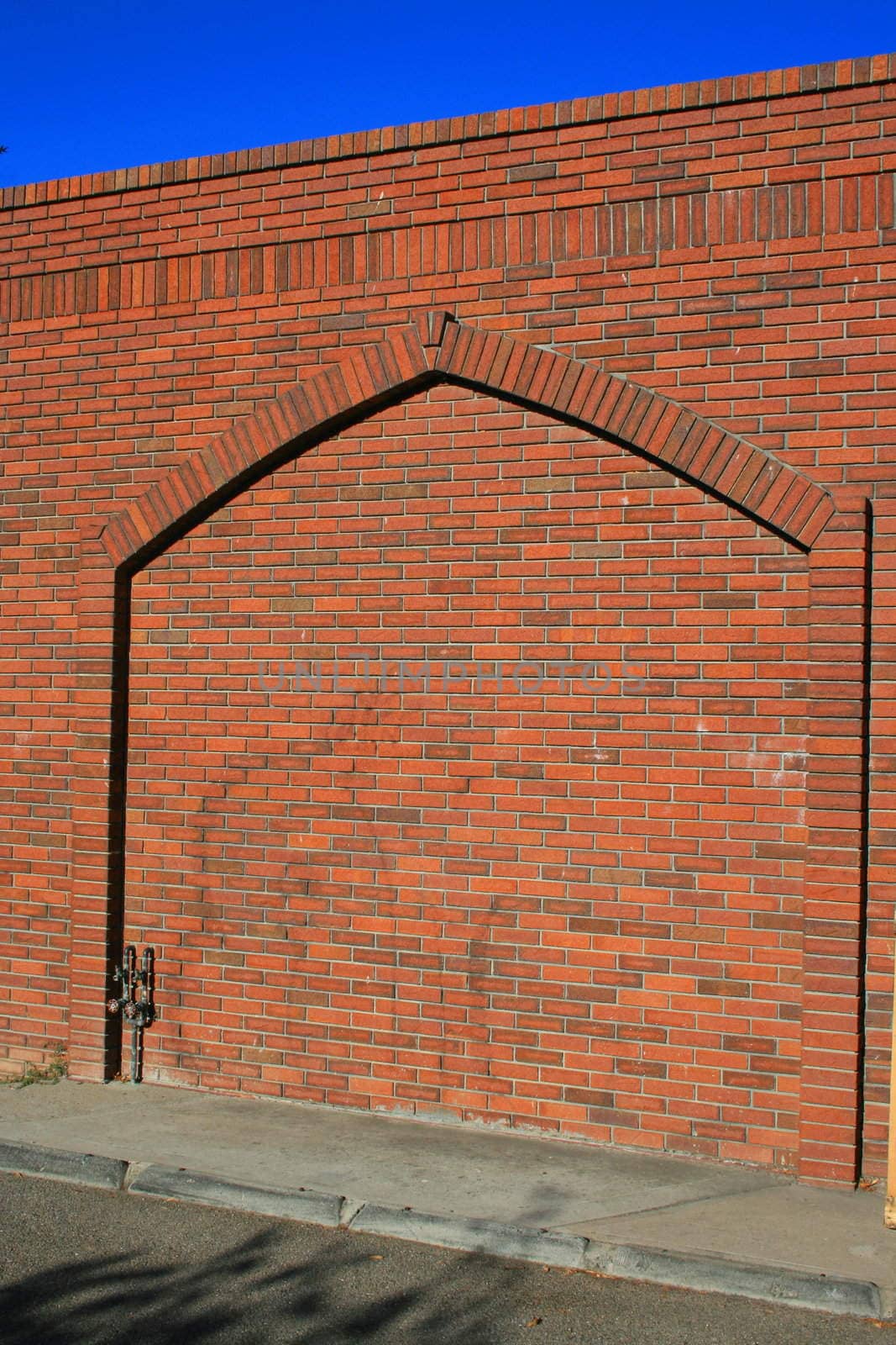 Close up of a brickwall showing unique pattern.
