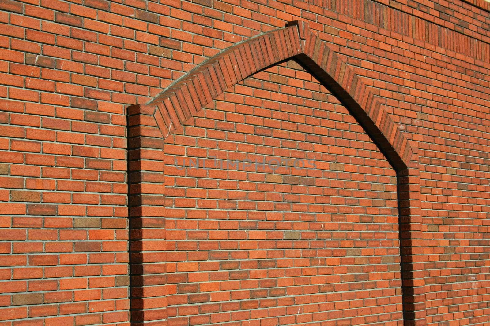 Close up of a brickwall showing unique pattern.
