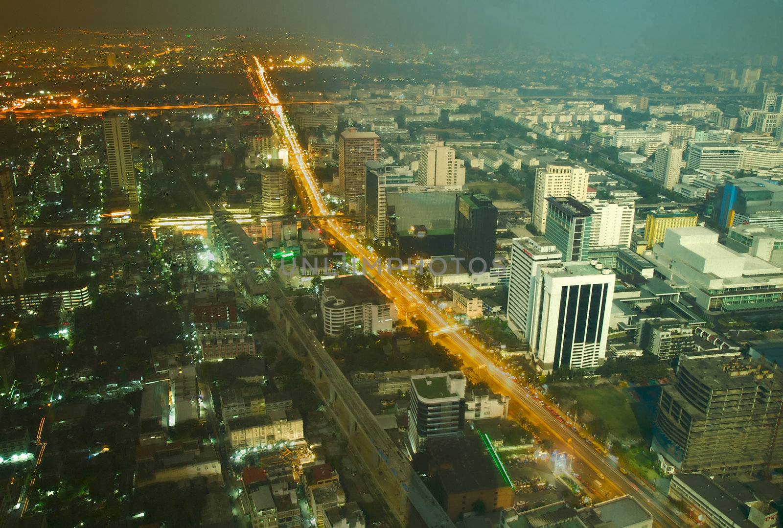 Combined image of day and night aerial view of Bangkok downtown. Thailand