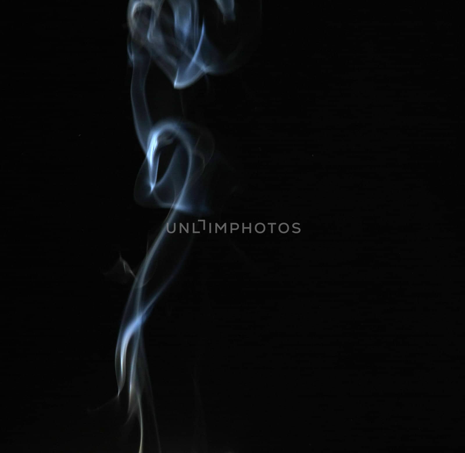 Smoke with a black background. Abstract element to help your design