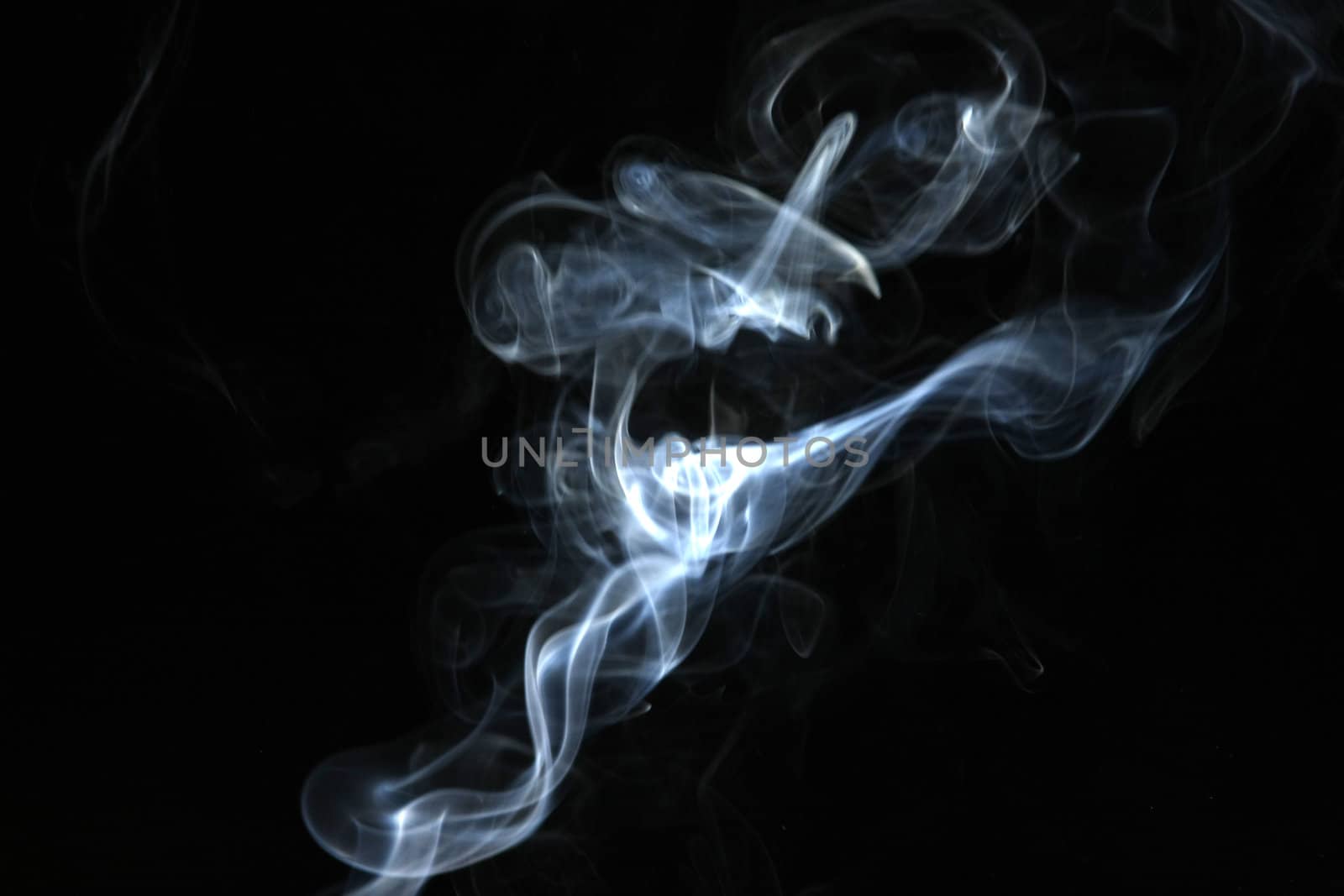 Smoke with a black background. Abstract element to help your design