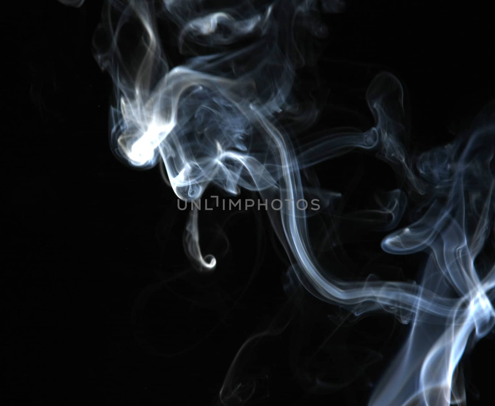 Smoke with a black background. Abstract element to help your design