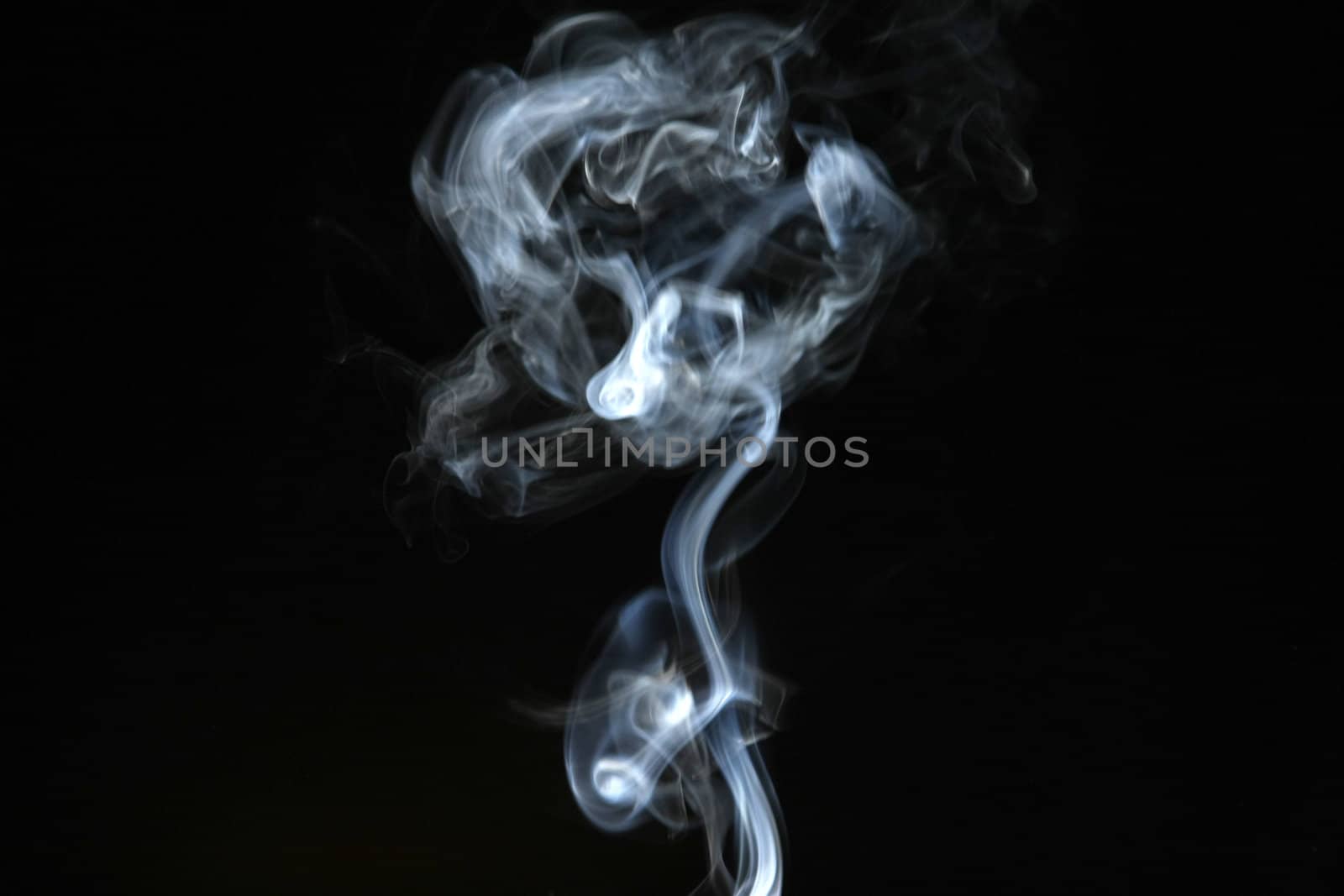 Smoke with a black background. Abstract element to help your design