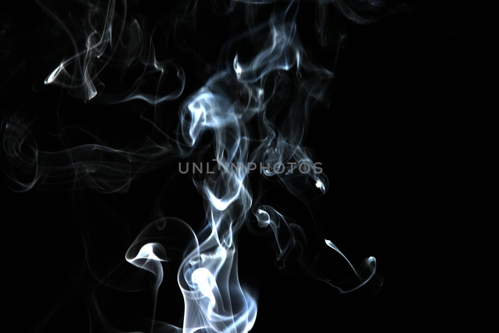 Smoke with a black background. Abstract element to help your design