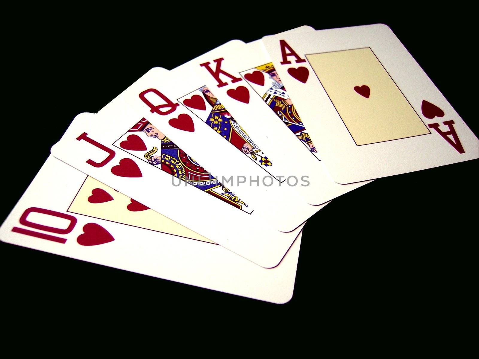 an image with a royal flush on black background