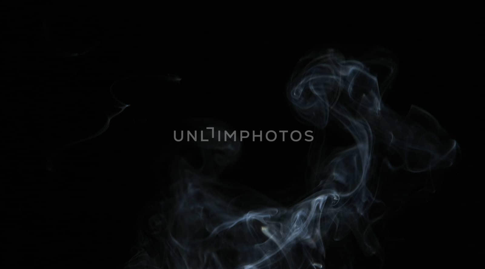 Smoke with a black background. Abstract element to help your design