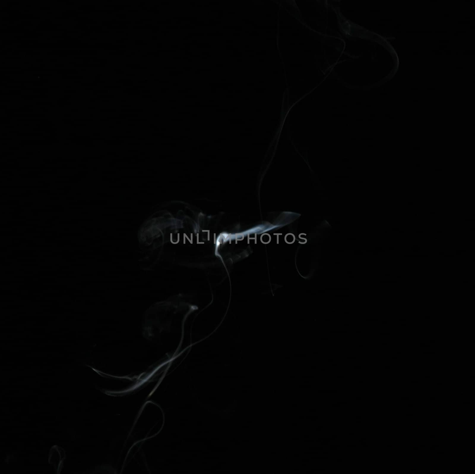 Smoke with a black background. Abstract element to help your design