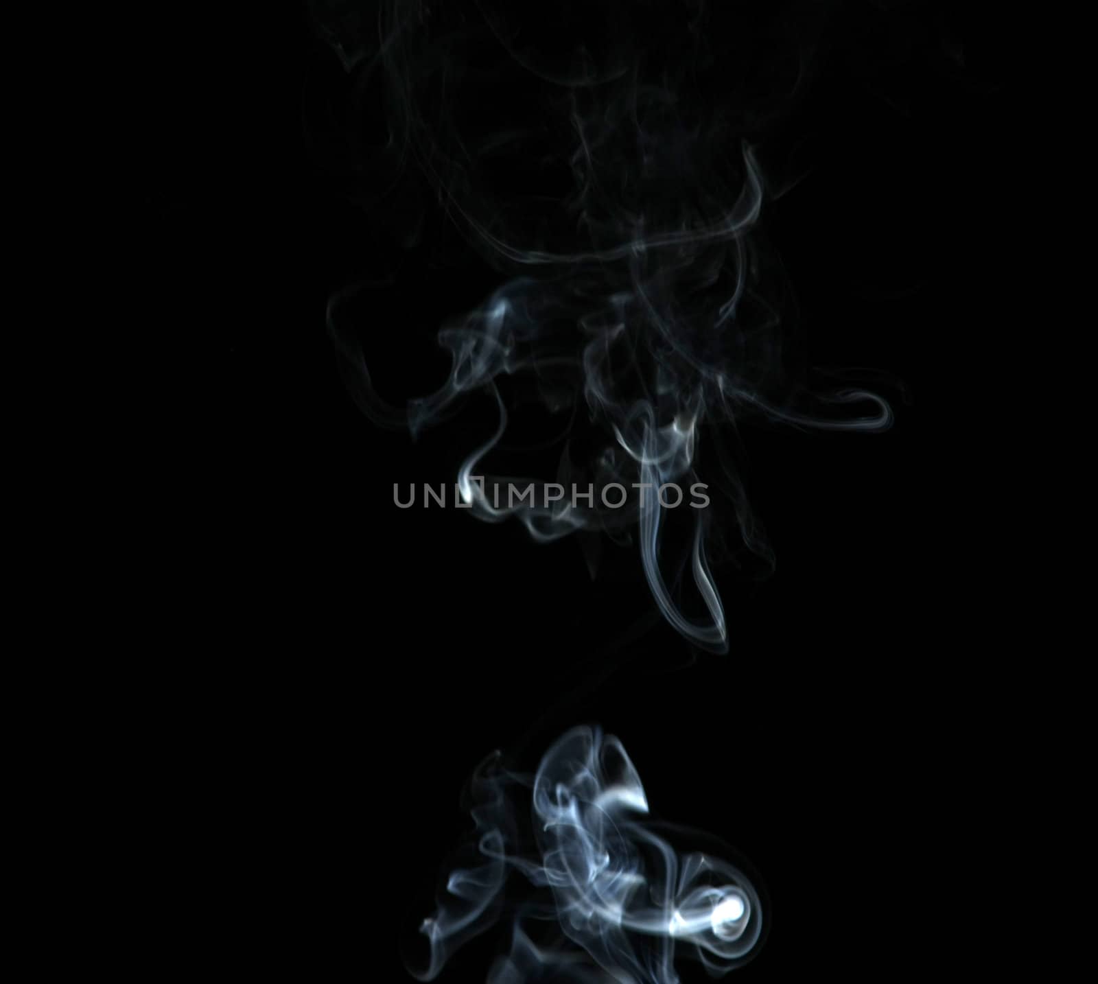 Smoke with a black background. Abstract element to help your design