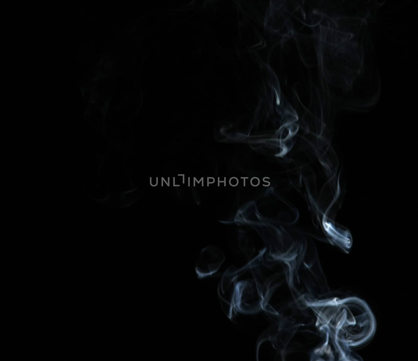 Smoke with a black background. Abstract element to help your design