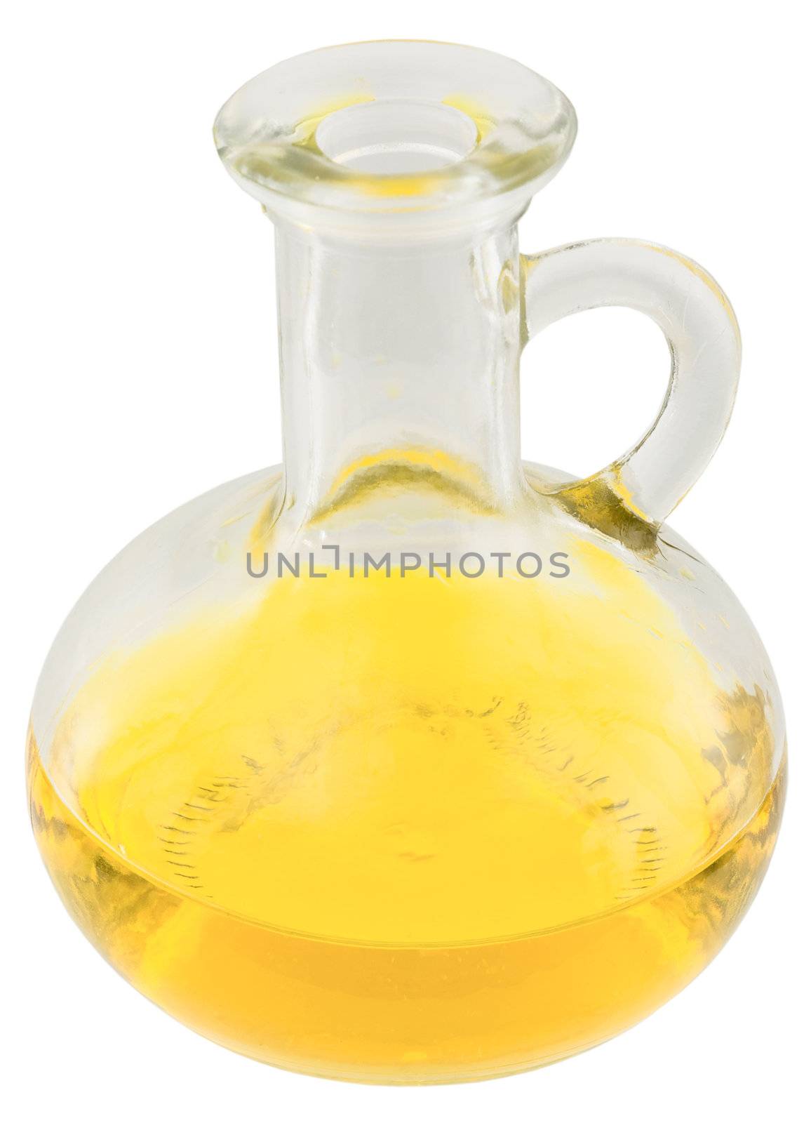 Carafe with yellow oil on white background