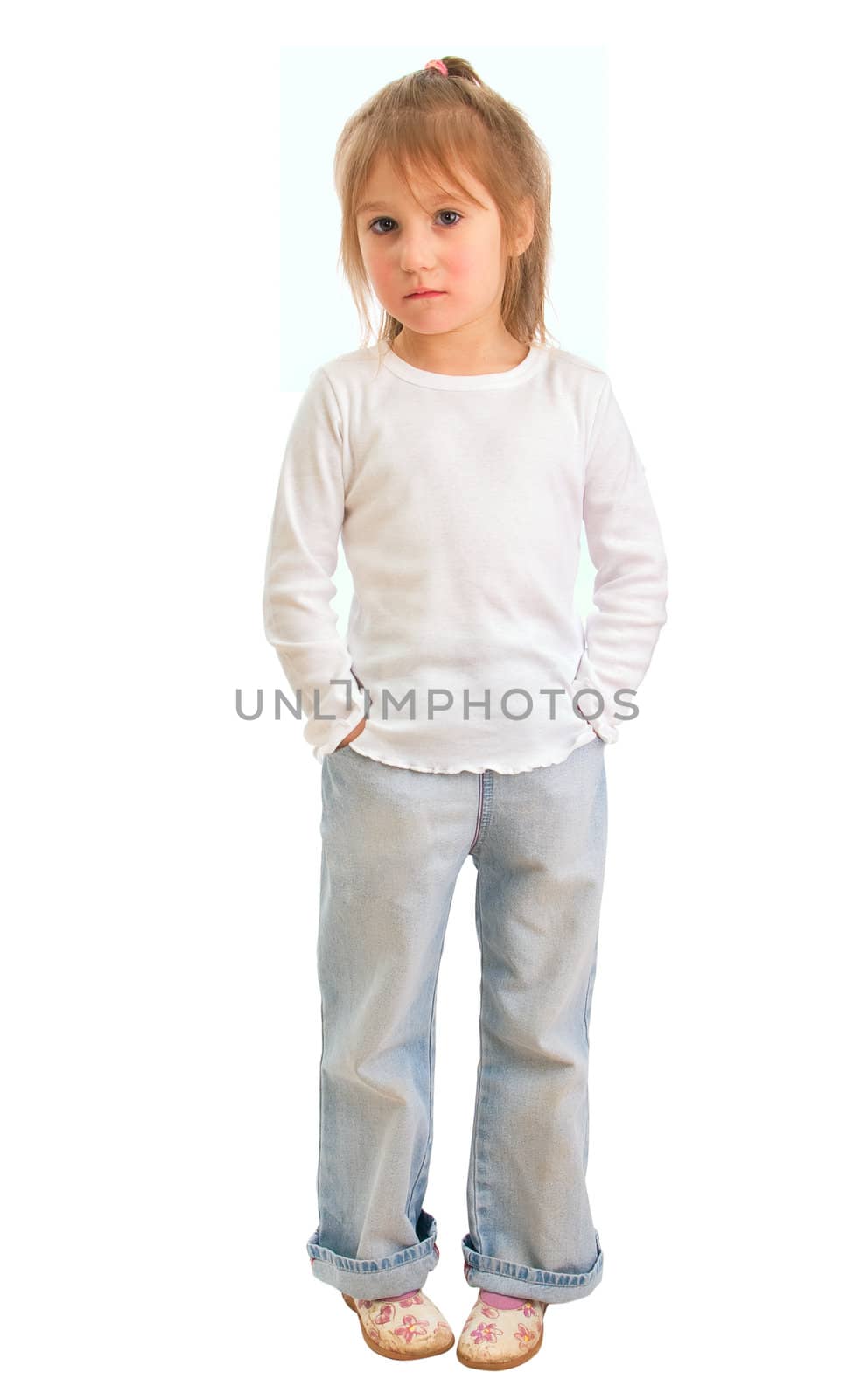 Girl of five years in a white shirt and blue jeans isolated on a white background