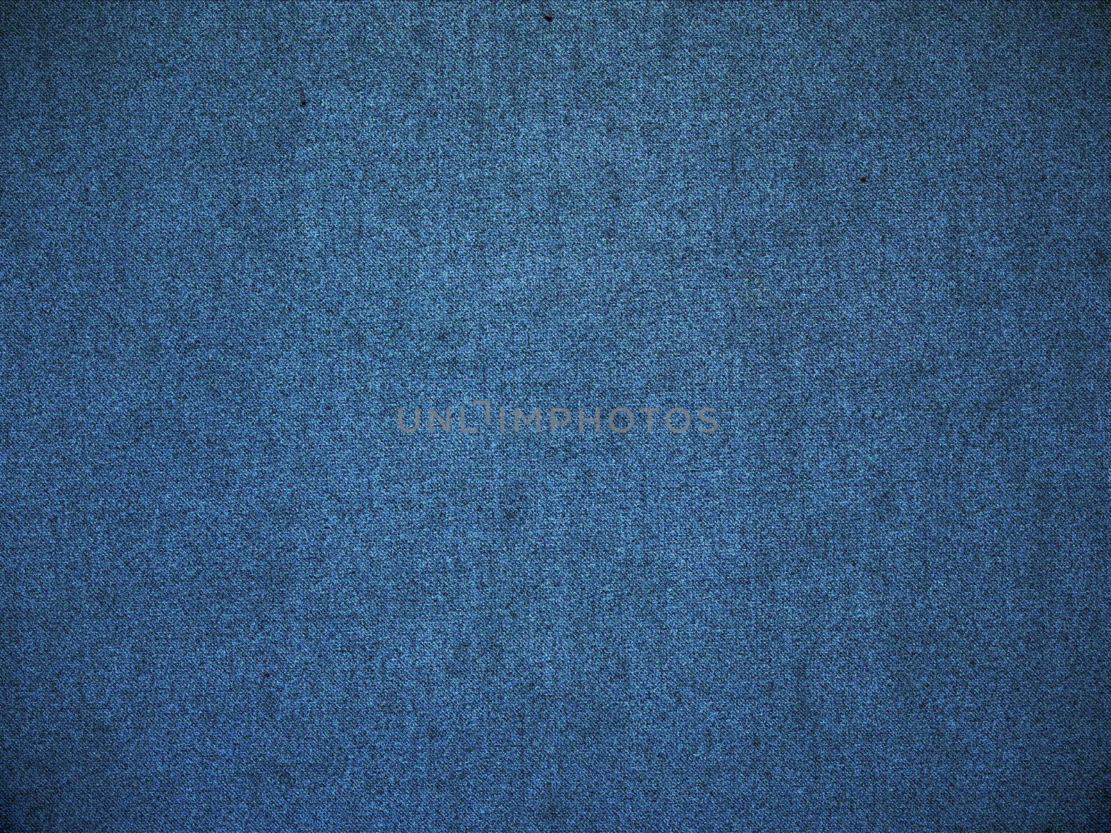 Texture denim. Cloth rough, worn, with small defects, slight darkening at the corners. Realistic fabric pattern for all purposes