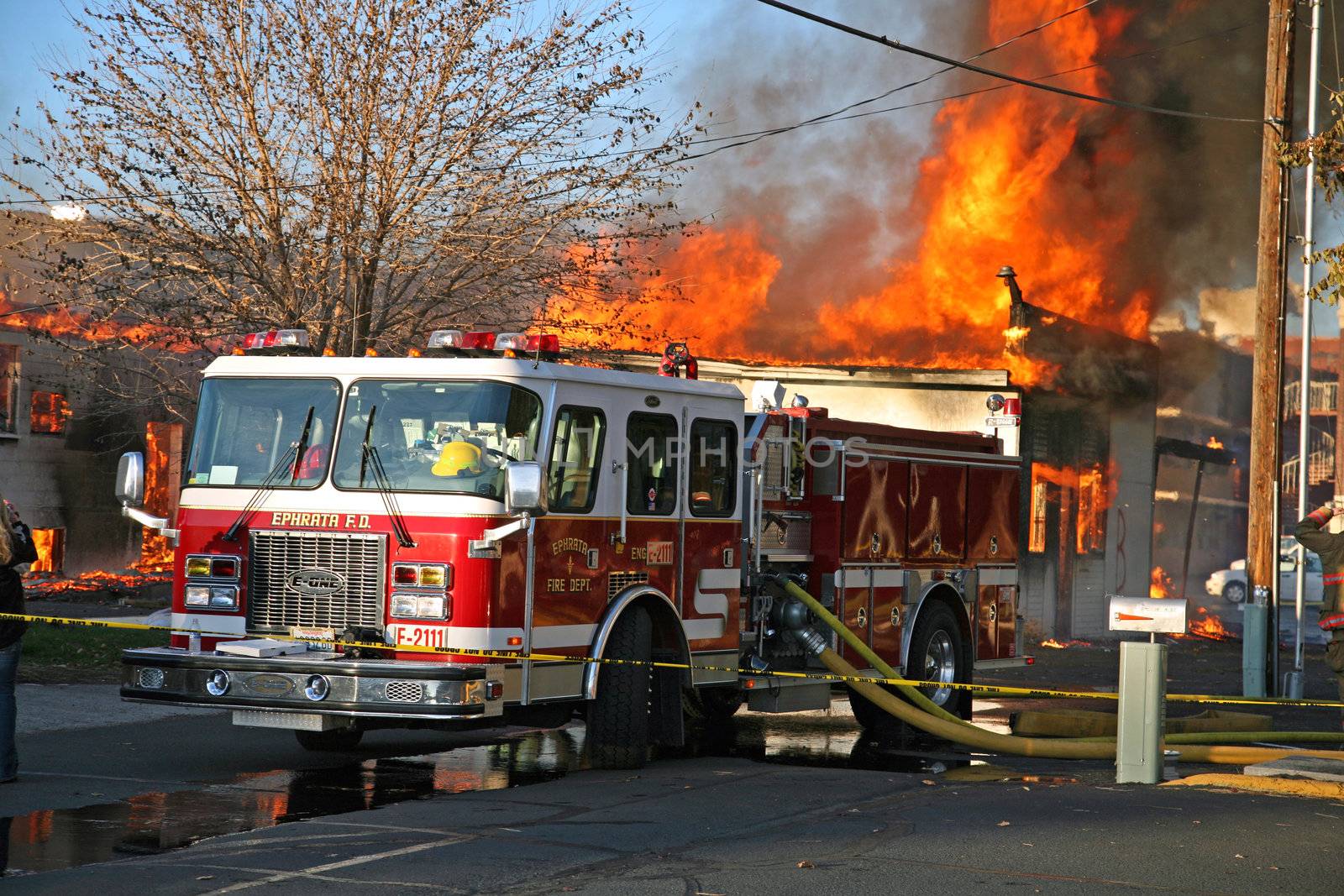 Deliberate house burn in Ephrata, Washington; local volunteer fire department burned house at owner's request
