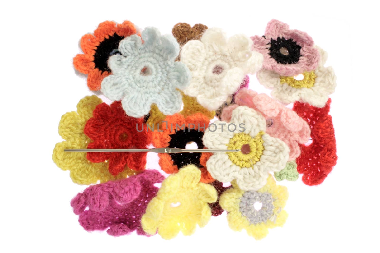 Close up of woolen flowers isolated in white