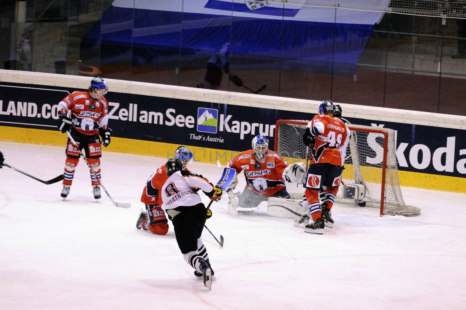 ZELL AM SEE; AUSTRIA - SEPTEMBER 4: Red Bull Salute Tournament Semifinal. Joel Kwiatkowski shoots at Berlin goal.  Game between SC Bern and Eisbaeren Berlin (Result 1-5) on September 4, 2010.