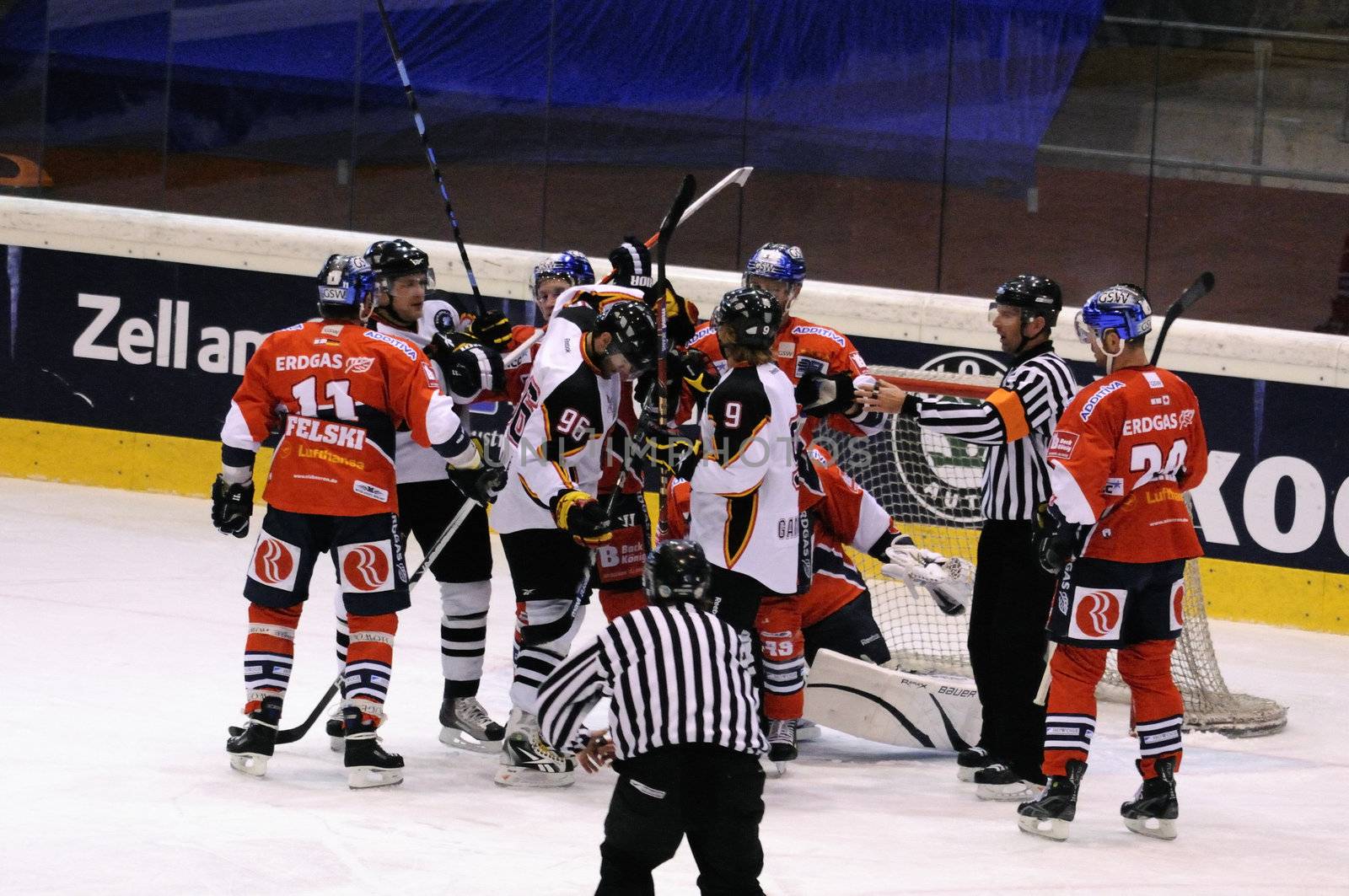 ZELL AM SEE; AUSTRIA - SEPTEMBER 4: Red Bull Salute Tournament Semifinal. Scrum in front of Berlin net.  Game between SC Bern and Eisbaeren Berlin (Result 1-5) on September 4, 2010.