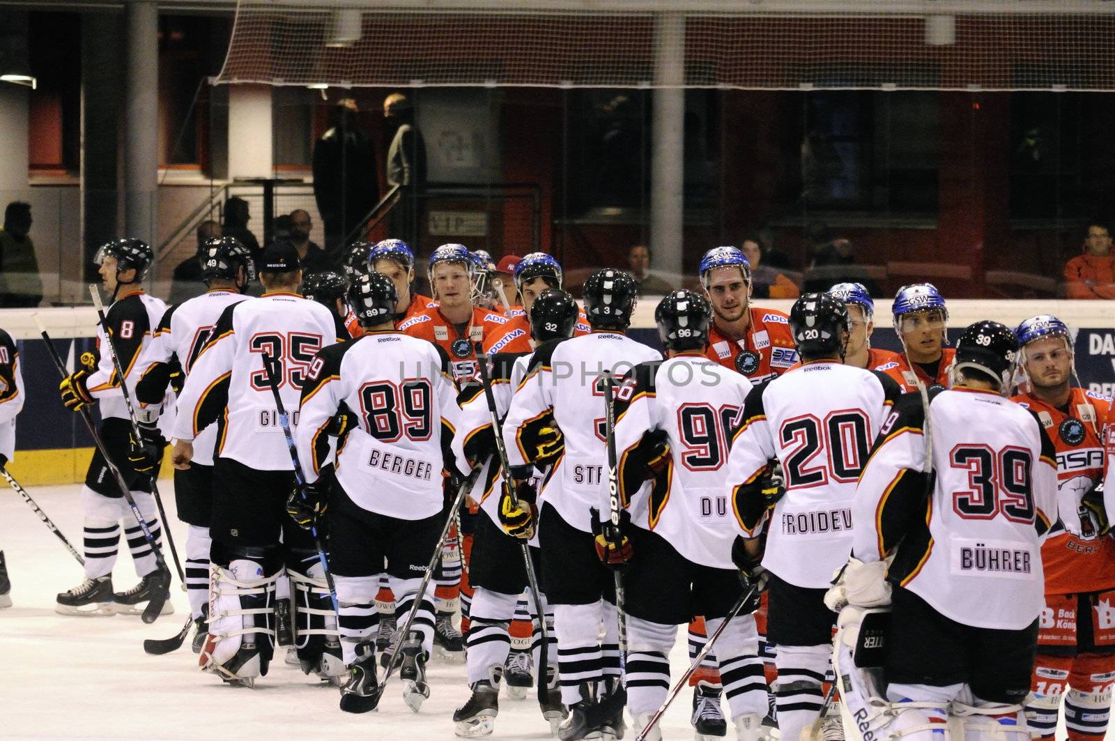 ZELL AM SEE; AUSTRIA - SEPTEMBER 4: Red Bull Salute Tournament Semifinal. Shake hands after the game. Game between SC Bern and Eisbaeren Berlin (Result 1-5) on September 4, 2010.