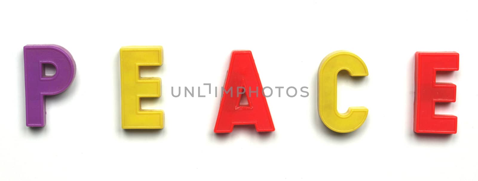 Peace word written with plastic toy letters