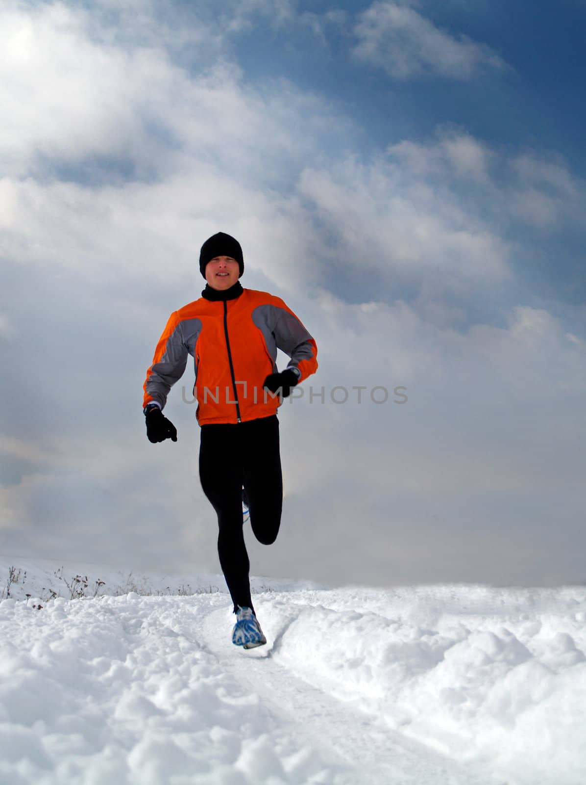 An athlete exercising on a cold winter day
