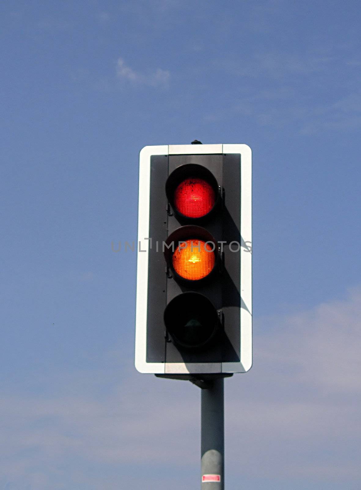 traffic lights as they change from red to amber both lights still on
