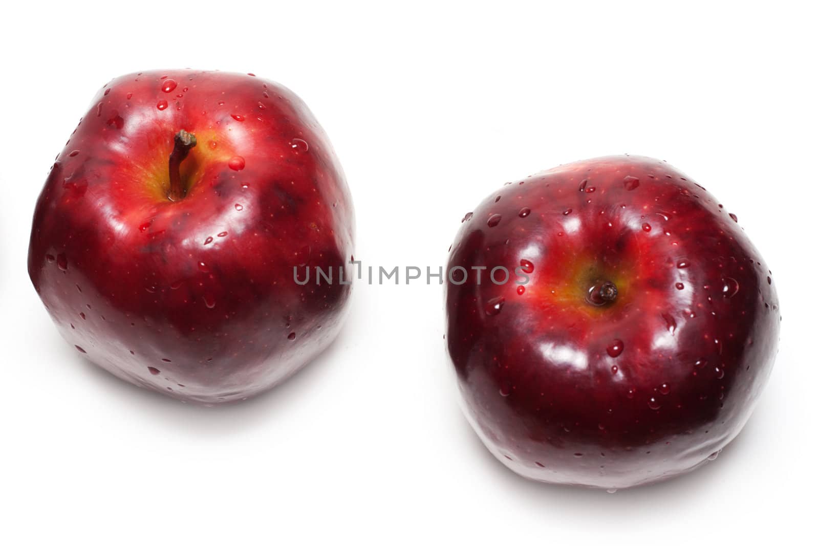 Two apples with drop of water insulated on white background