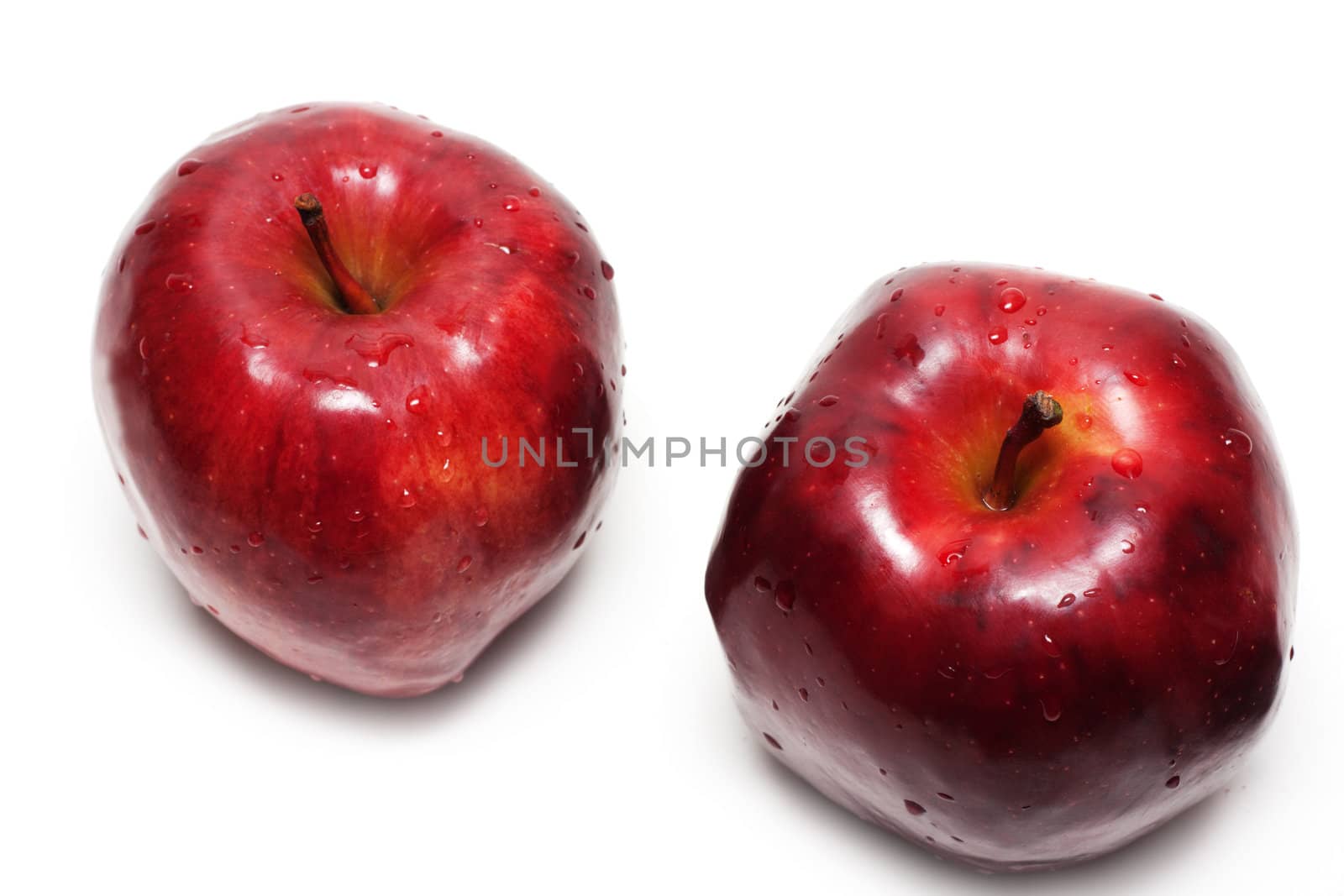 Two apples with drop of water insulated on white background