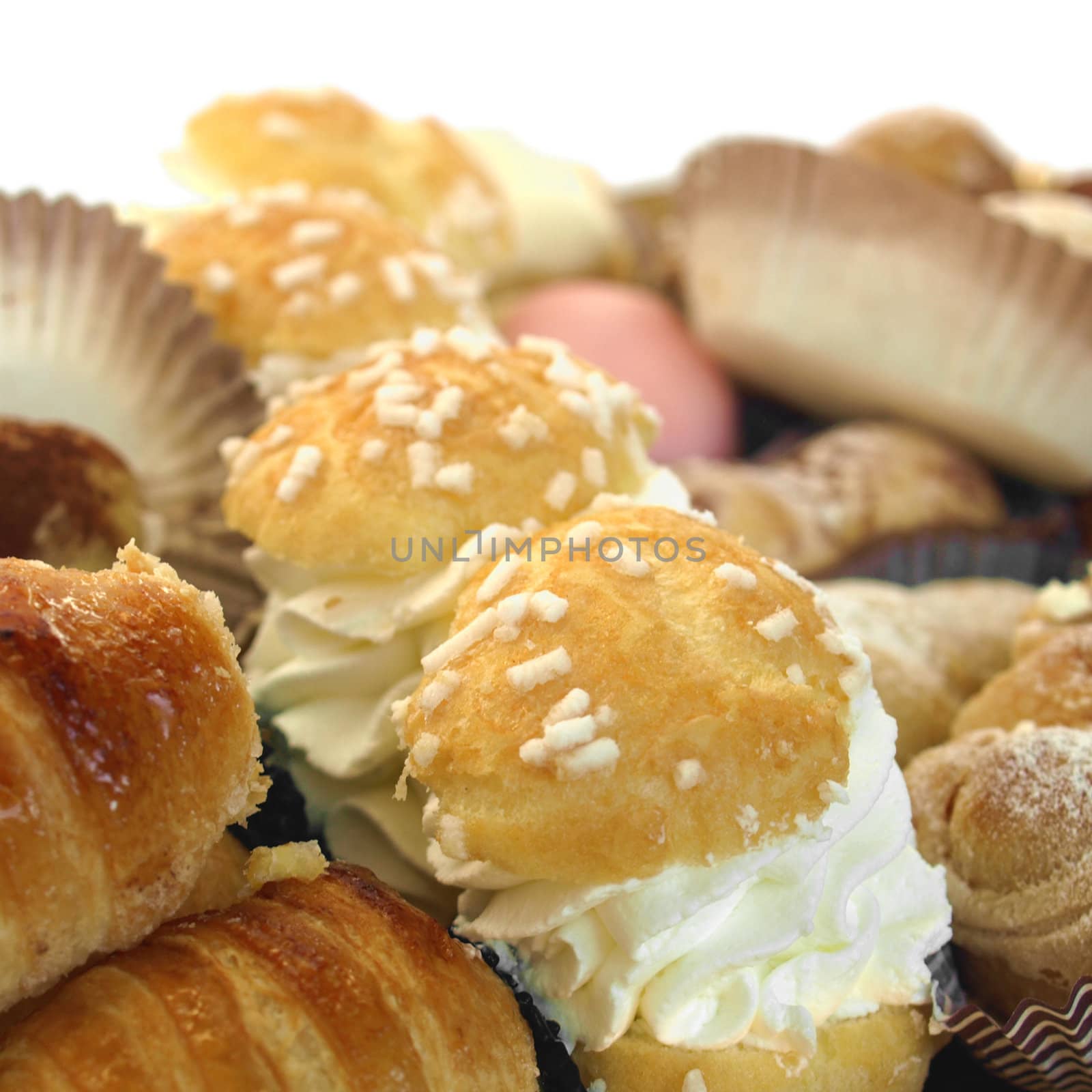 Mixed pastries with chocolate, cream, fruit