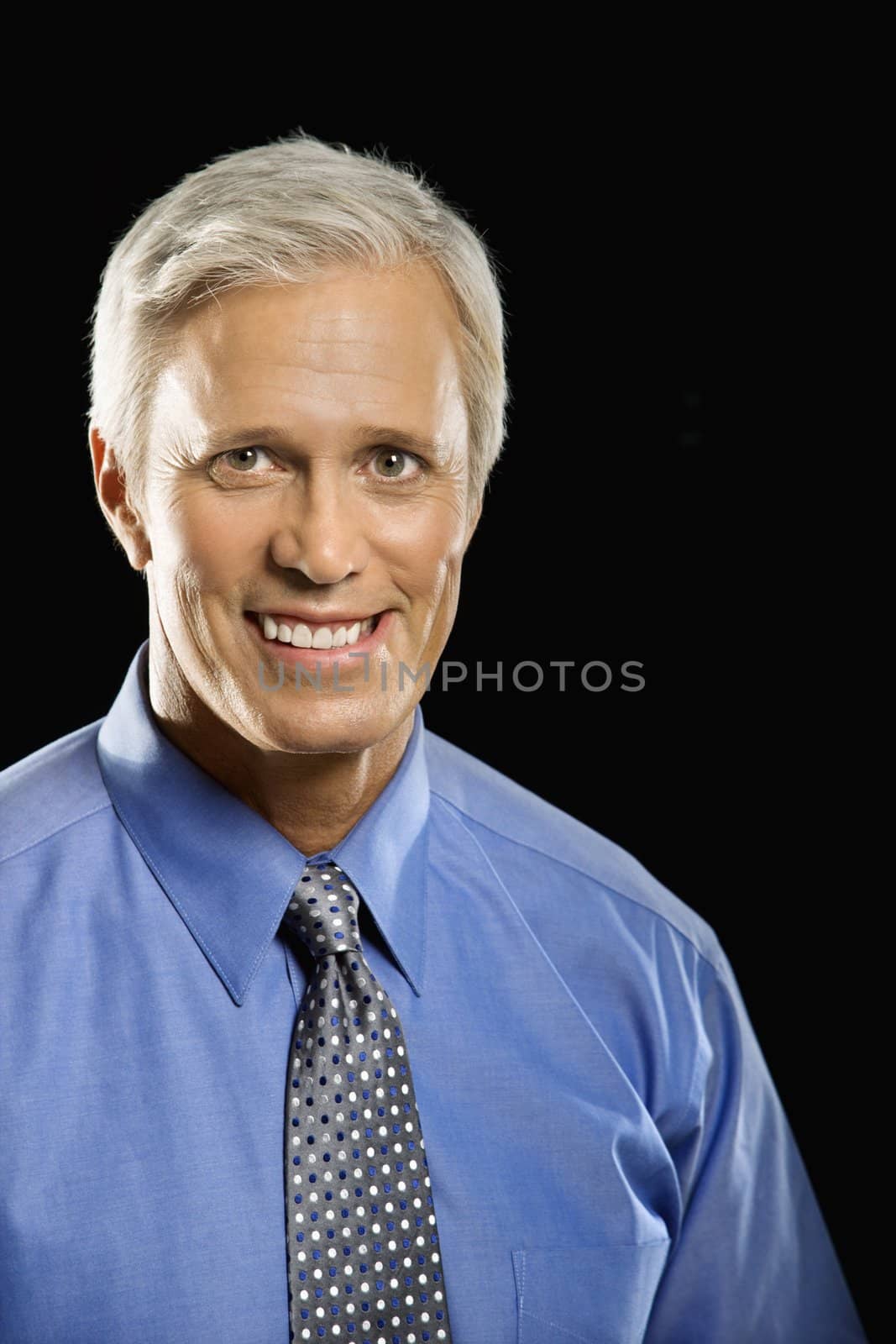 Caucasian middle aged businessman portrait.