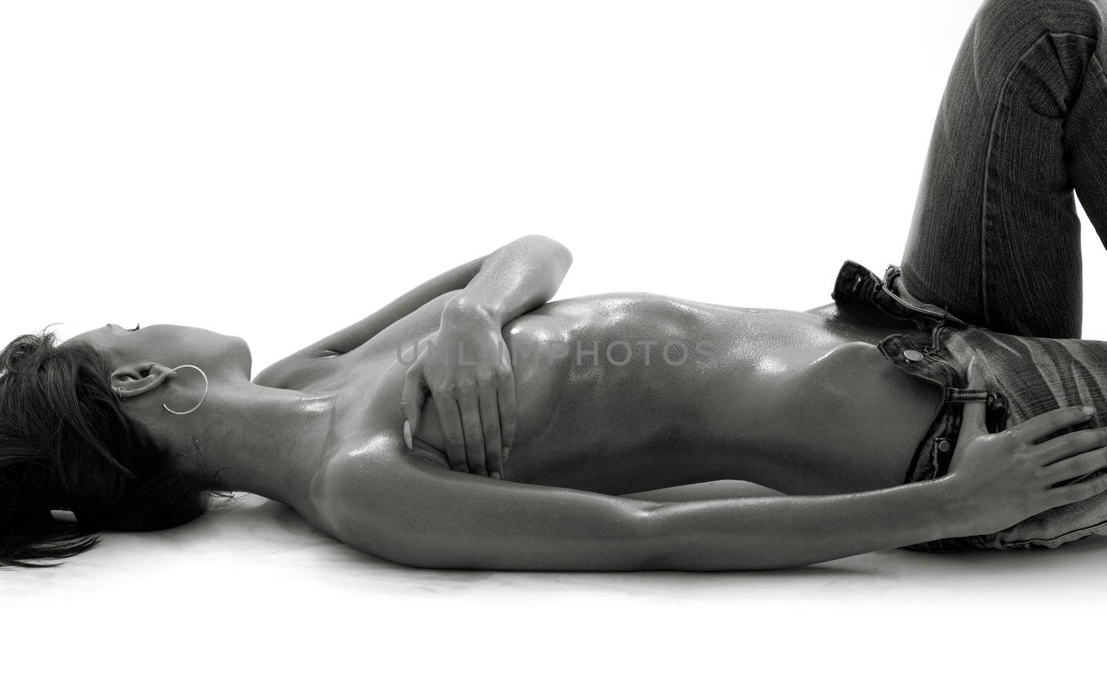 monochrome topless girl in jeans laying on the floor by dolgachov