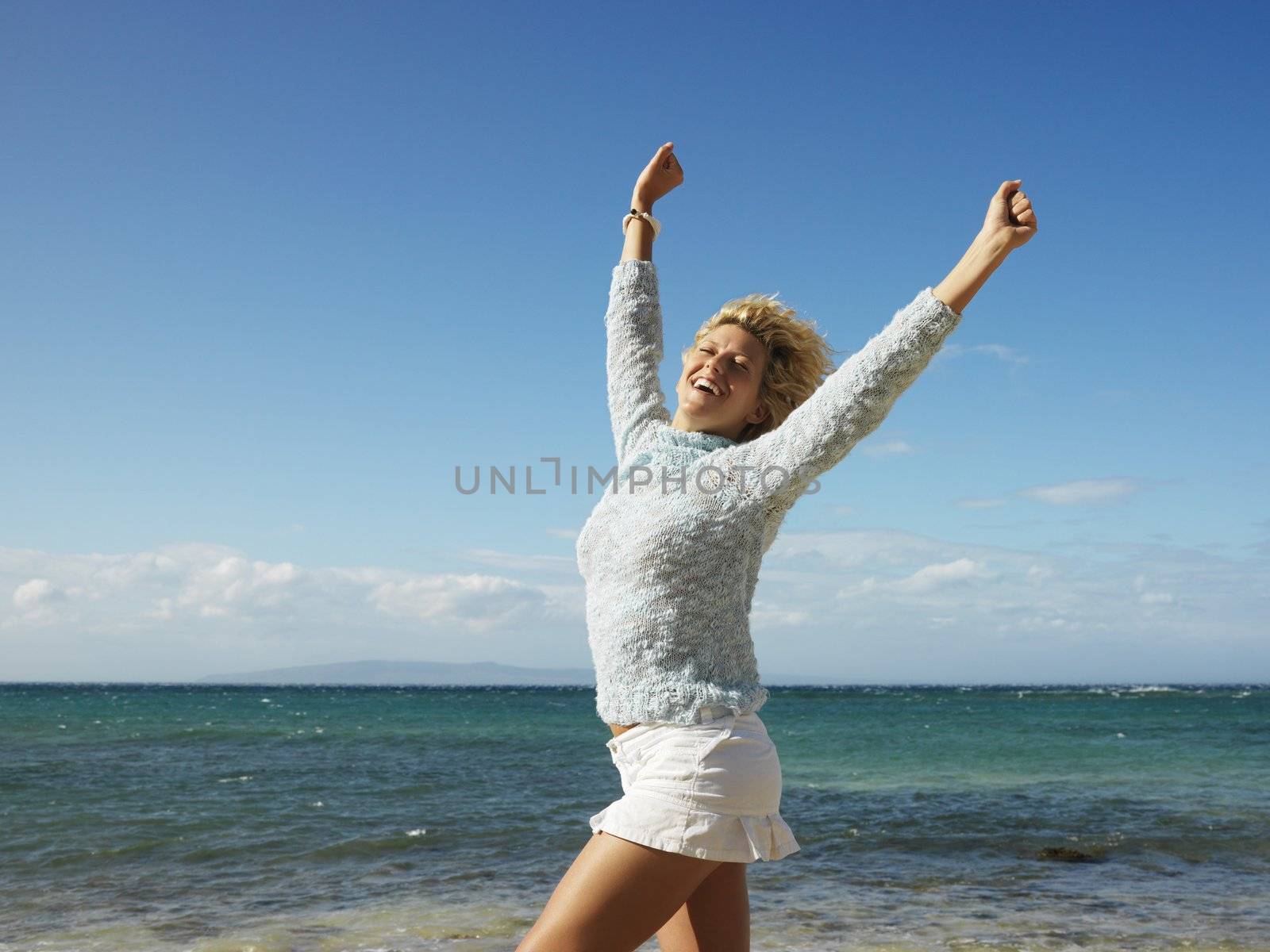 Joyful woman in Maui by iofoto