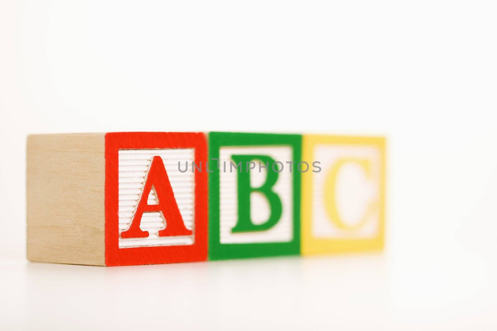 ABC alphabet blocks lined up.