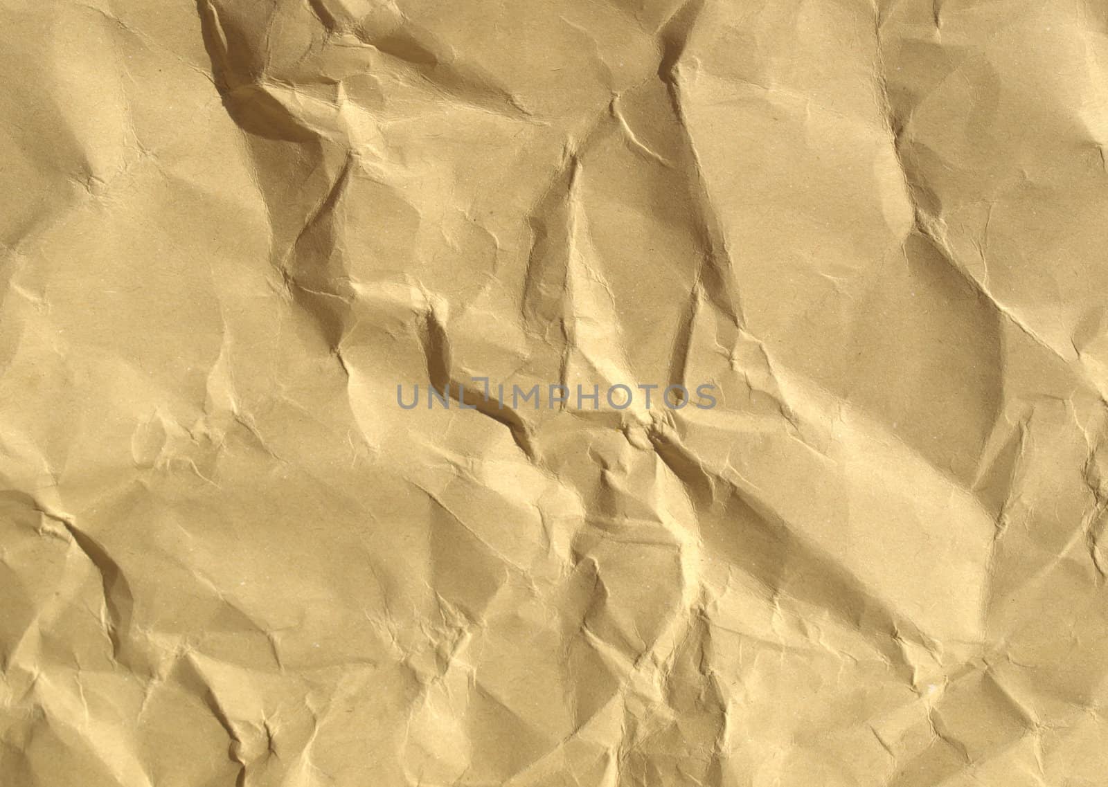 Sheet of brown and rippled paper background