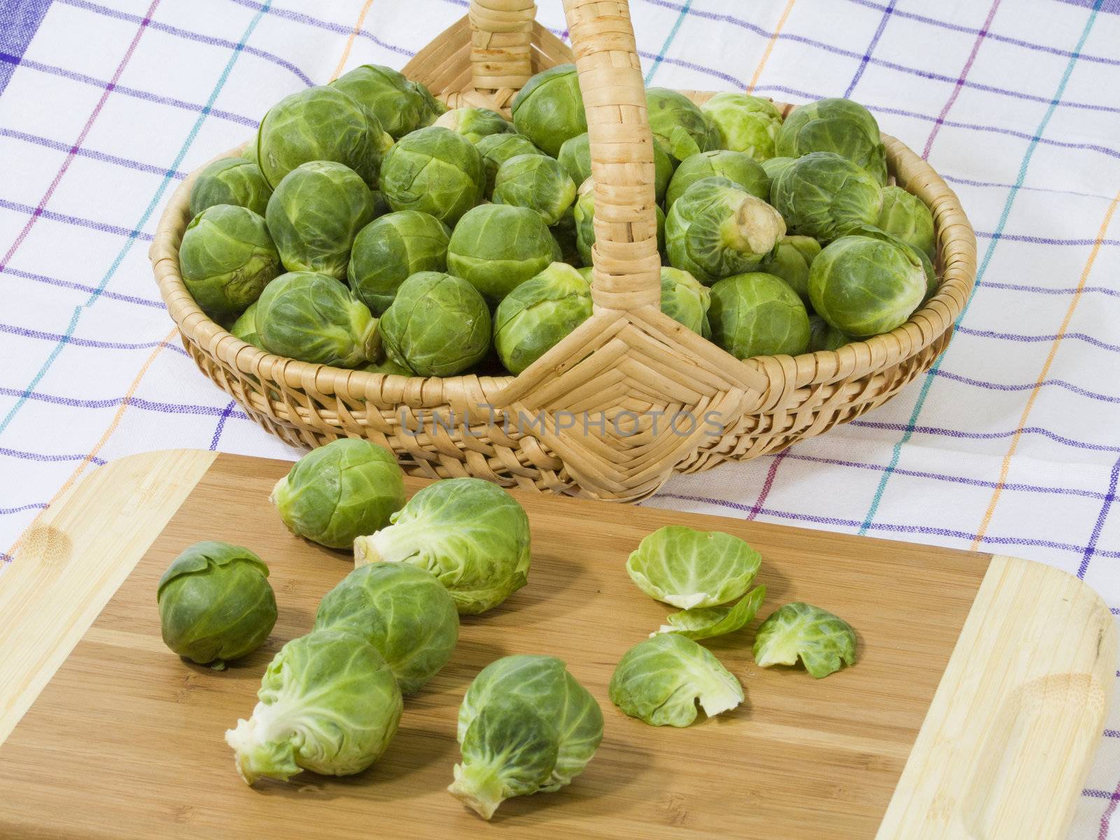 Preparation of brussels sprouts on a wooden plate