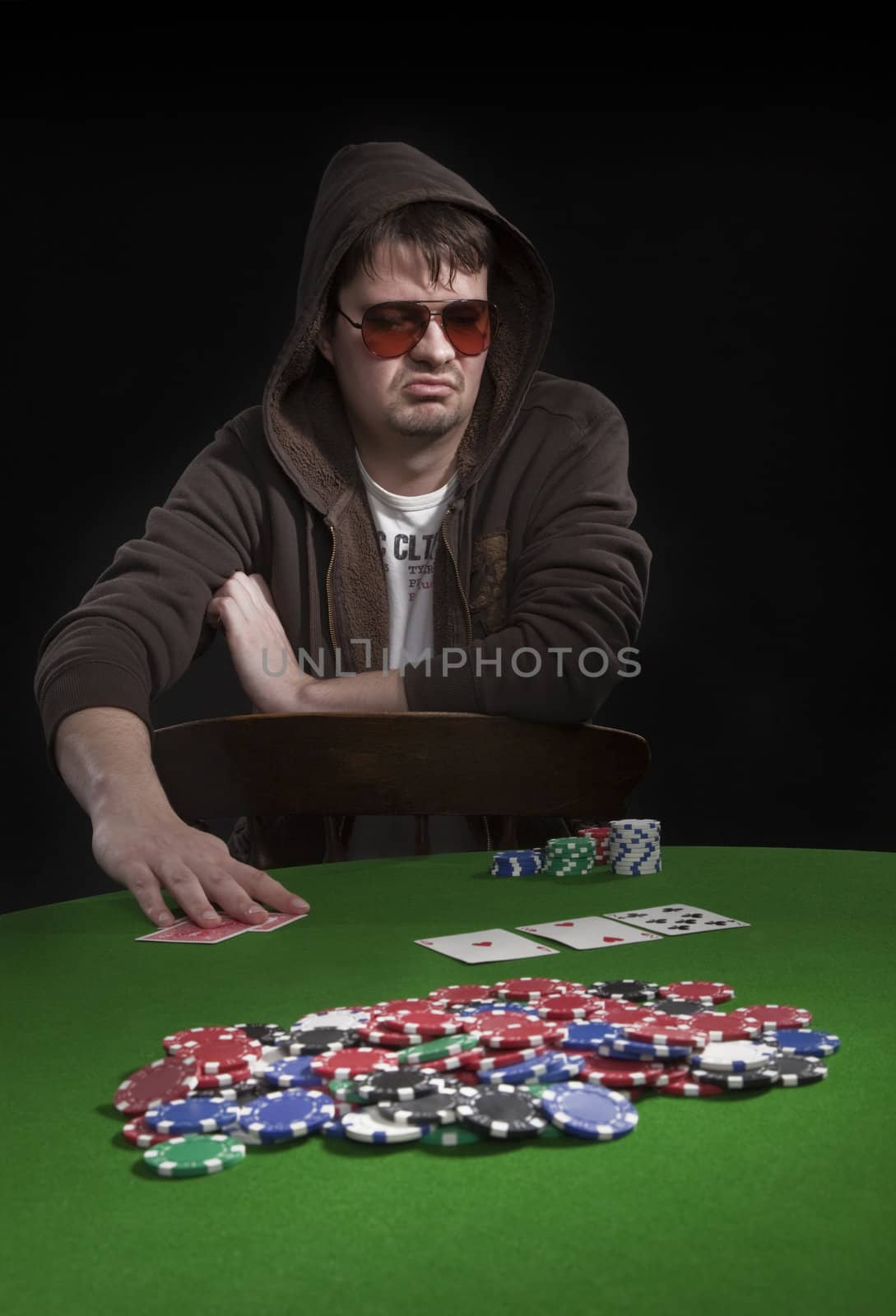Man playing poker by mjp