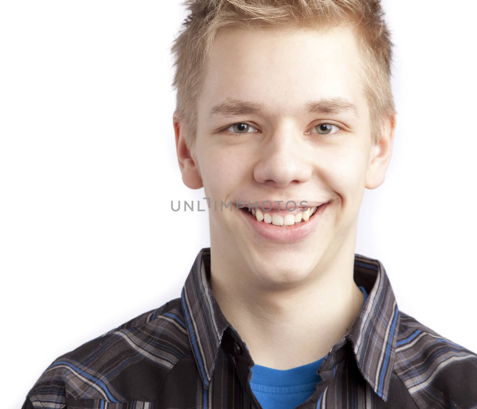 Isolated teen boy posing and over white background