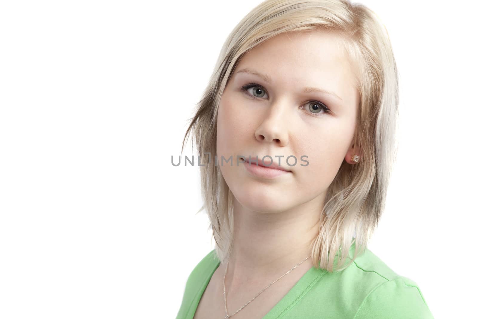 isolated cute teenage girl in green shirt over white background