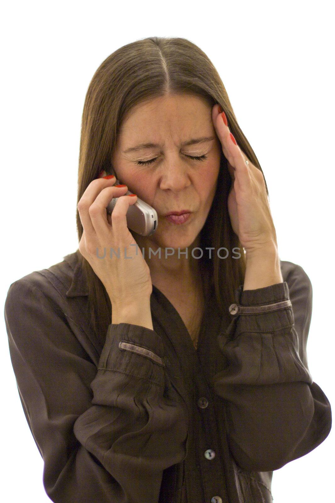 image of a stressed out professional woman on a mobile phone